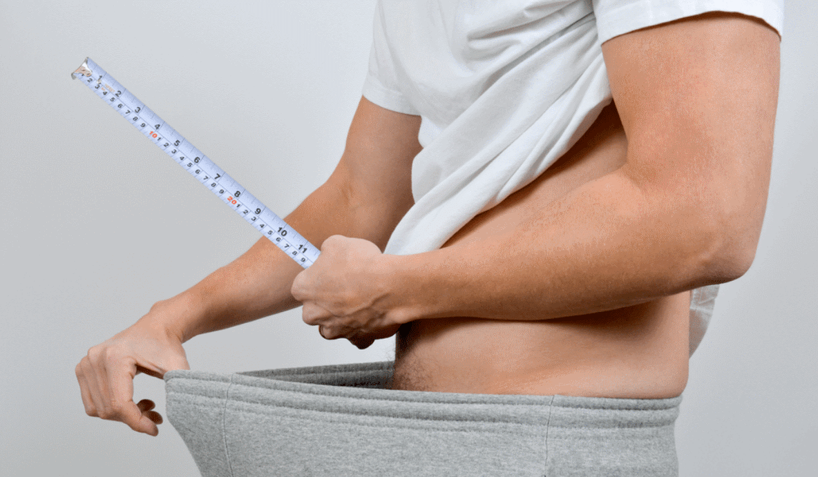 medição do pênis com um centímetro